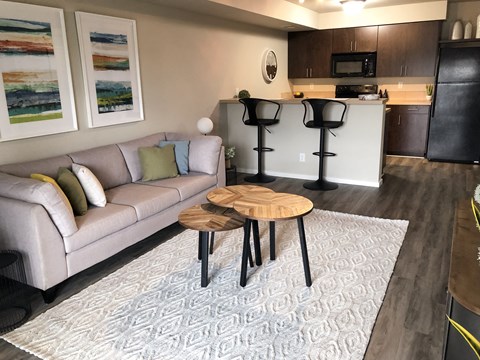 a living room with a couch and a table